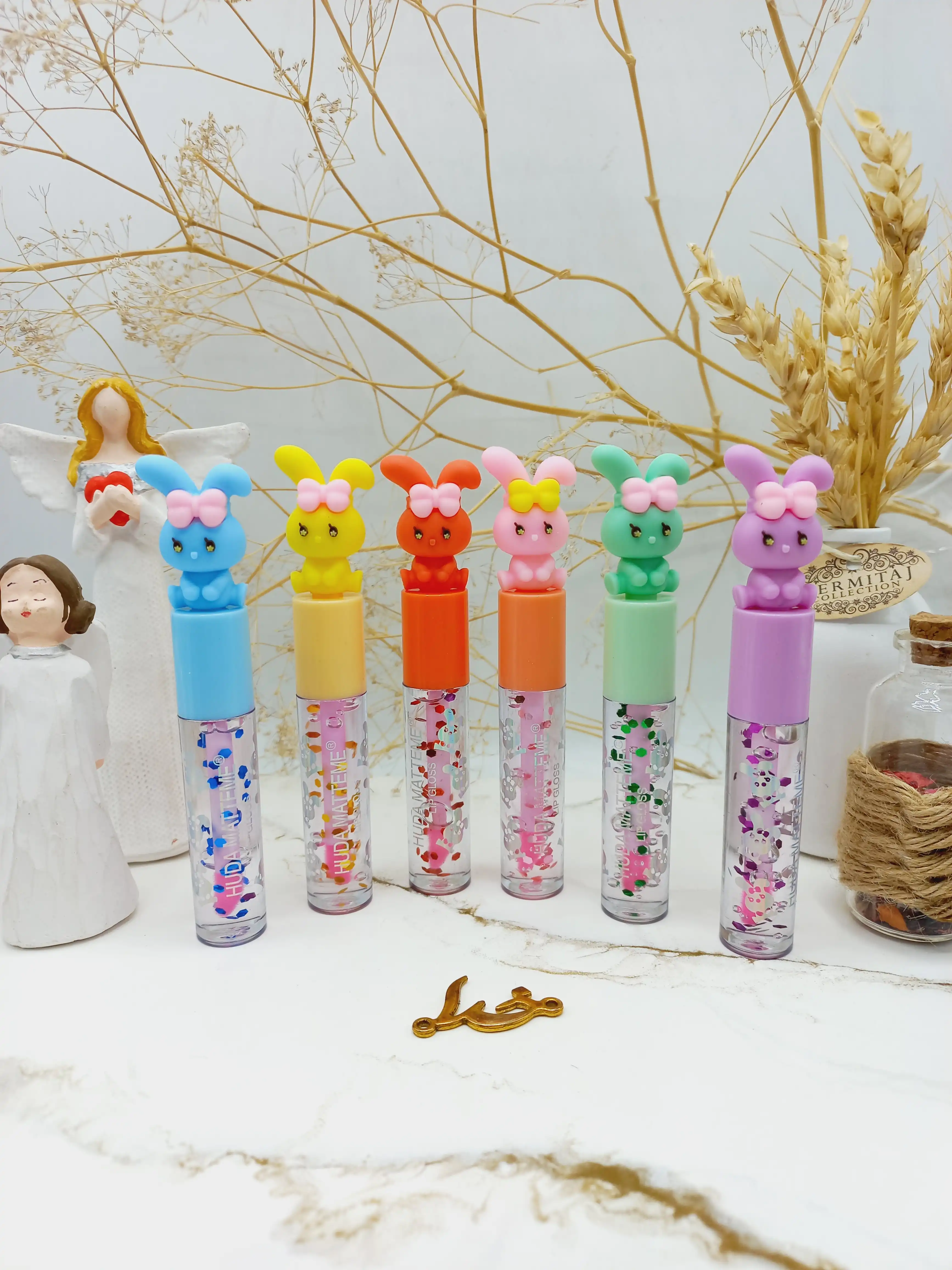 برق لب طرح بچه هدی مات می HUDA Matte Me کد X247