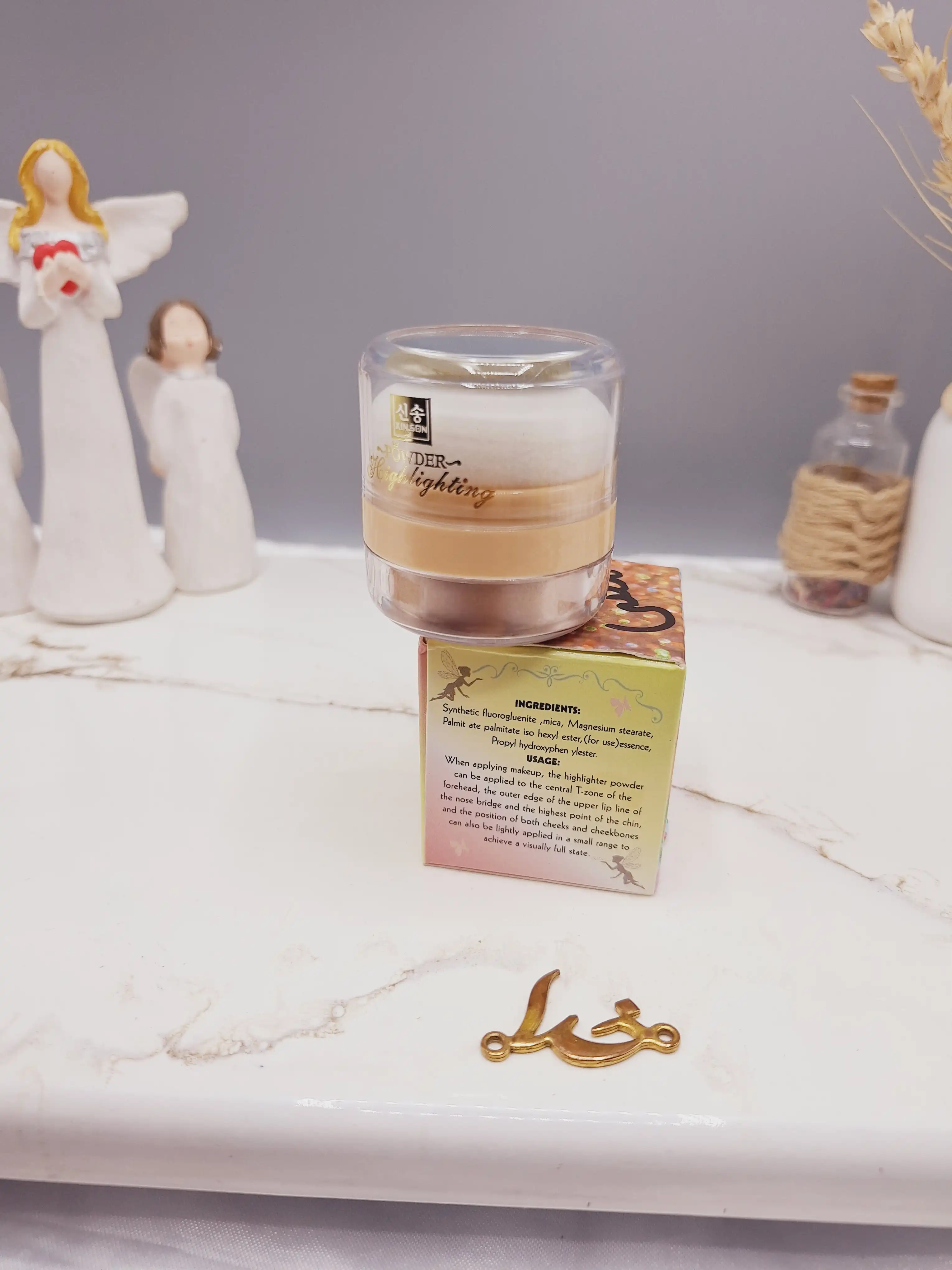 هایلایتر پد دار شاین ریز رنگ مسی مناسب کل بدن طرح پری برند POWDER کد XS-1096