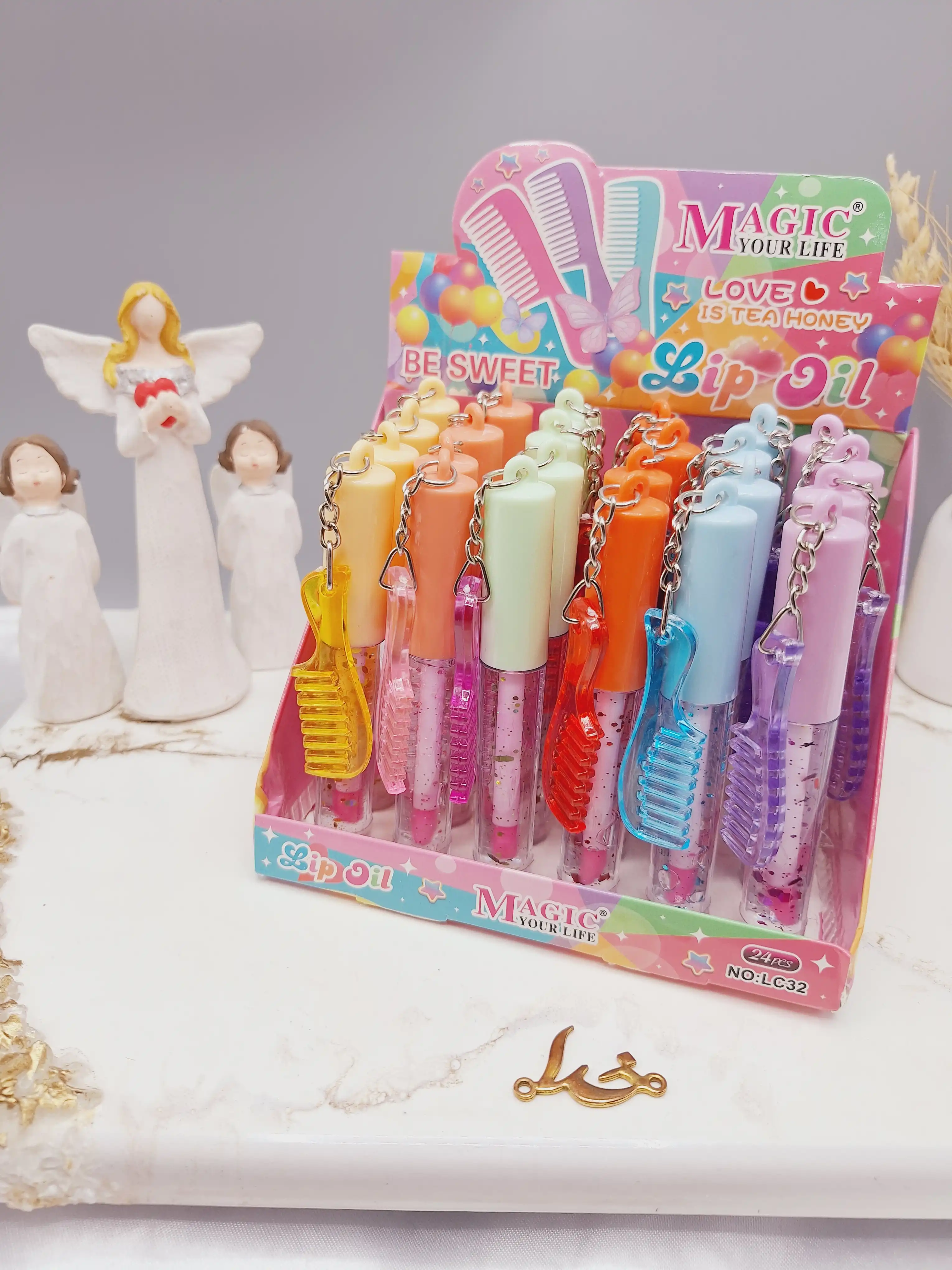 لیپ گلاس گلیتر دار طرح شانه ای برند مجیک کد LC32