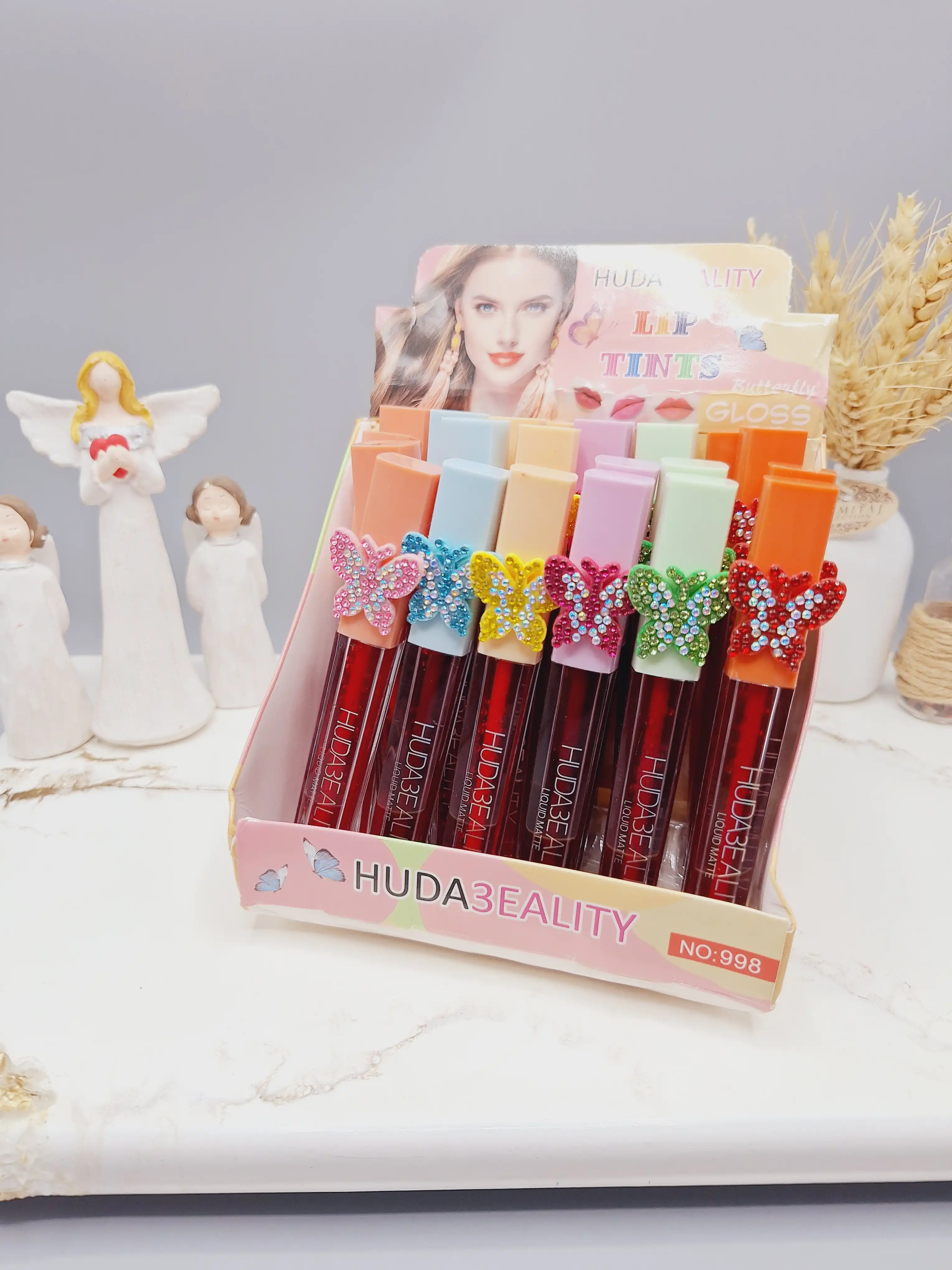 تینت لب پروانه نگینی برند HUDA3EALITY کد 998